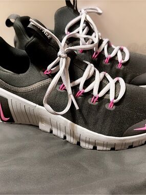 Nike Women’s Black and Pink Slip-On Athletic Sneakers